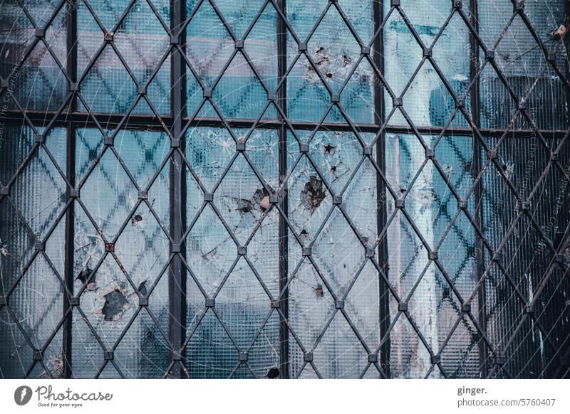 Barred, splintered and broken - old window behind bars Grating Old Window Broken Deserted Exterior shot Colour photo Facade House (Residential Structure)