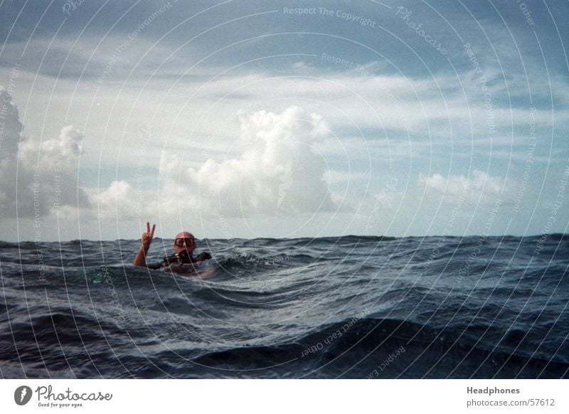 comming_up Ocean Waves Dive Human being Masculine Man Adults Head 1 Water Clouds Storm clouds Thunder and lightning Lake Blue Loneliness Fear Maldives Diver