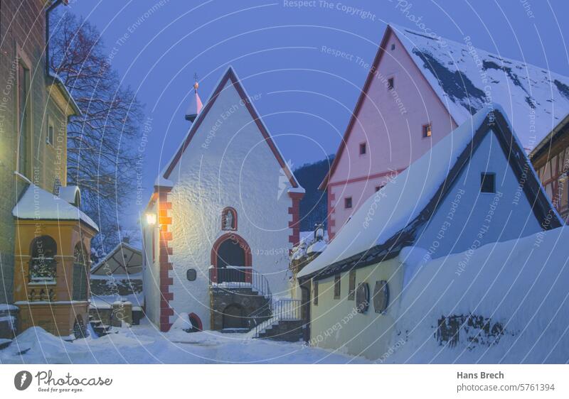 Snow-covered church square Zeil am Main in the evening Zeil on the Main Church yard Winter Twilight blue hour Anna Chapel Parish church of St. Michael City hall