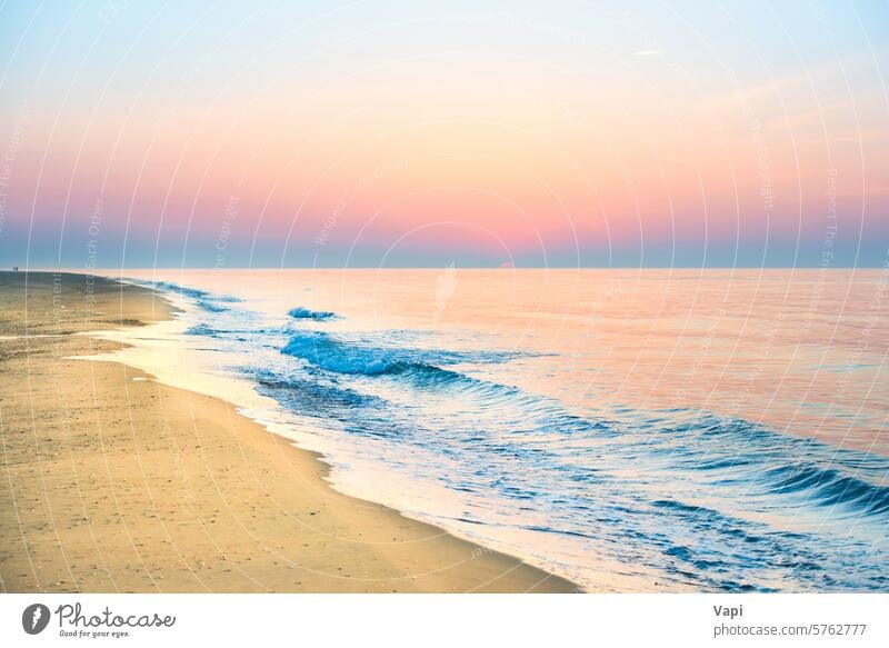 Sunset on beach with sea waves sunset sunrise summer sky landscape sand nature dawn background dusk ocean water beautiful color orange morning sunlight golden