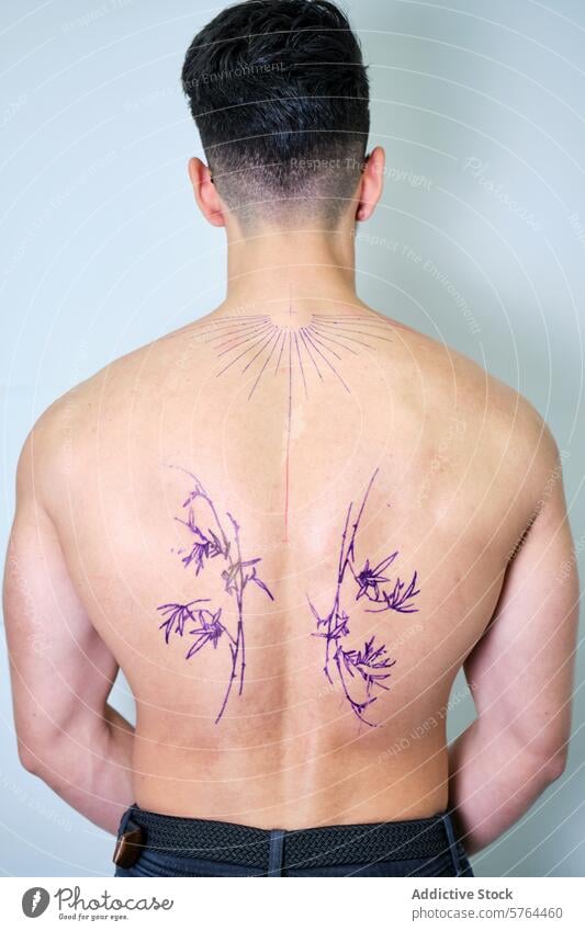 Back Tattoo Preparation on an unrecognizable Male Client tattoo preparation outline male back ink studio artwork body art design drawing skin client artist