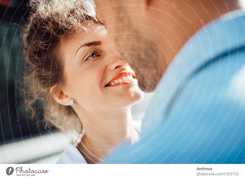 guy and a girl happily walk in the morning on the empty streets young hairstyle brown alone stone walls old fashionable europe joy counting emotions glasses