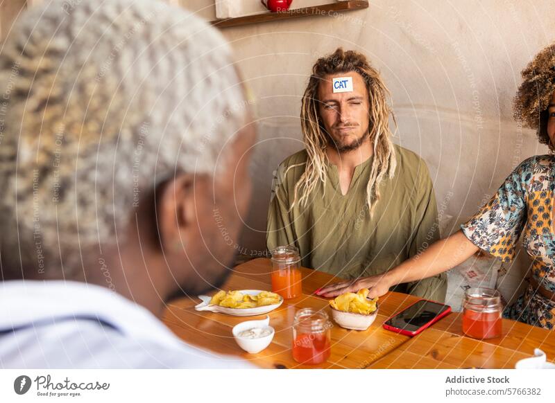 Friends playing guessing game at a casual bar friend fun sticky note diverse snack cozy group young adult man woman diverse ethnicity togetherness activity