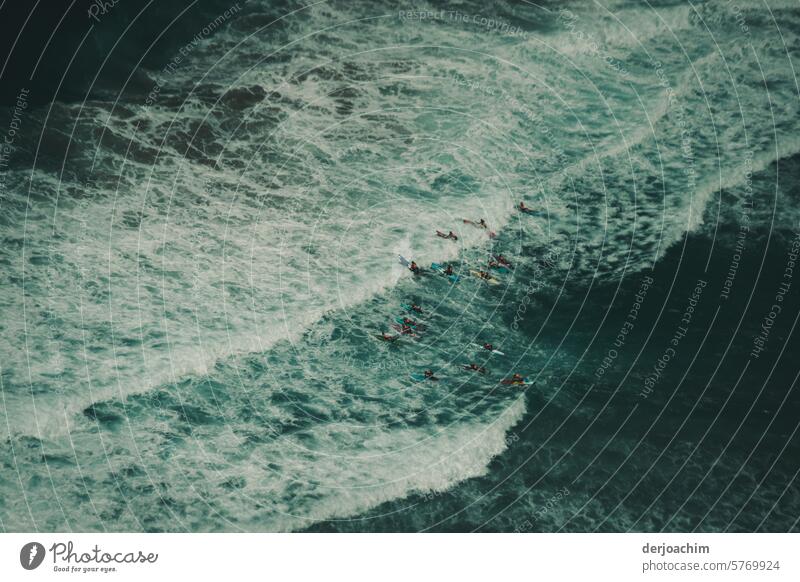 An incredible panoramic view from the 70th floor of a high-rise building in Surfers Paradise of the foaming sea with a few swimmers. Surf, coast Ocean Sky Waves