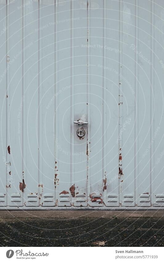 Garages in the city Garage door Gloomy Goal Closed Deserted Highway ramp (entrance) Highway ramp (exit) Building Architecture Parking garages Garage doors