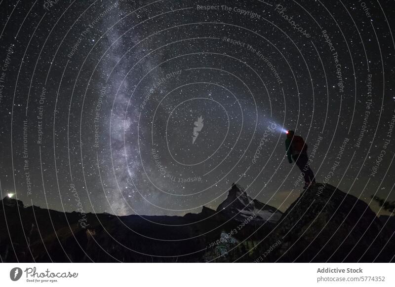 Stargazing at the Matterhorn under the Milky Way stargazing matterhorn milky way night sky headlamp adventurer swiss alps beauty nocturnal alpine switzerland