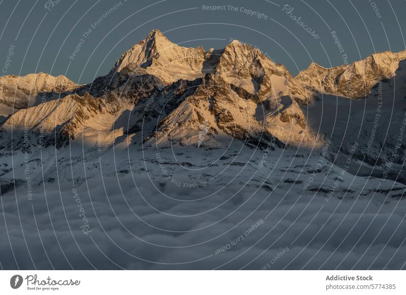 Majestic sunrise over Matterhorn peak and clouds matterhorn mountain alpine glow warm landscape serene breathtaking nature outdoor summit altitude high rock