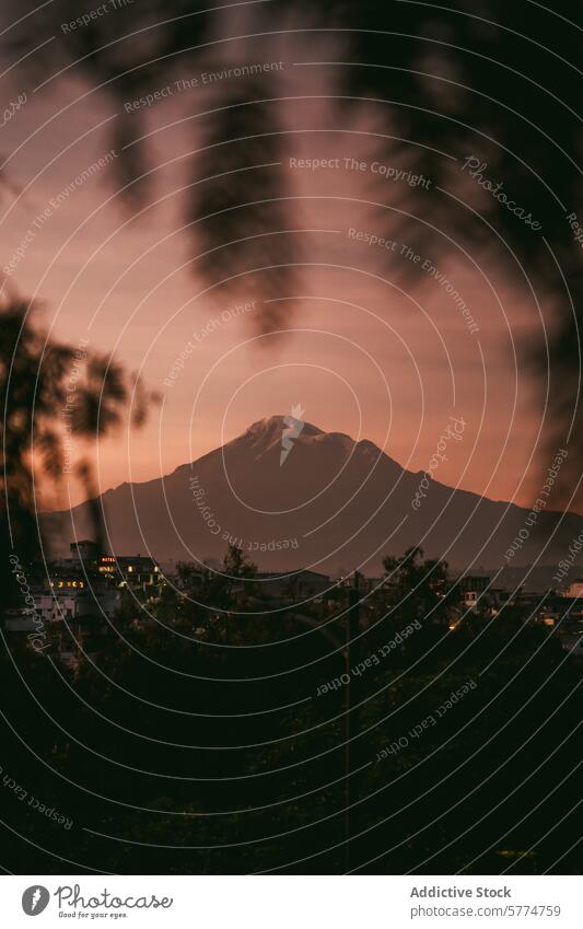 Chimborazo Volcano at dusk with red sky on the Equator volcano chimborazo cityscape equator twilight mountain peak nature landscape ecuador ethereal view andes