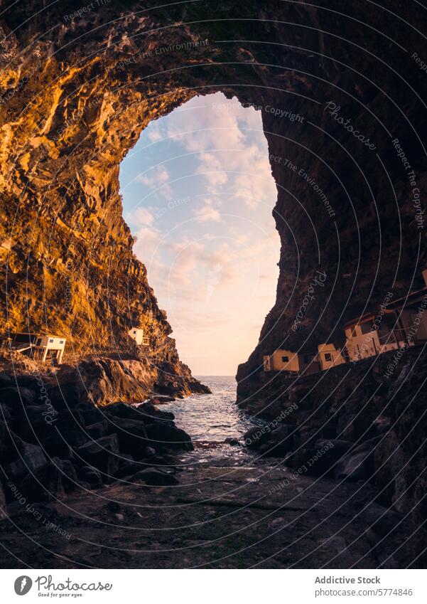 Majestic natural arch with ocean view in La Palma, Spain la palma spain rocky cove white house cliff sunset illuminated scene travel canaries canary islands