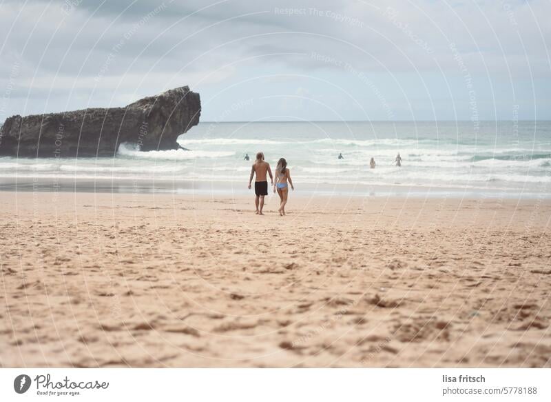 off into the water... Beach Couple Vacation & Travel Ocean Portugal Rock bathe hazy cloudy Summer Summer vacation Tourism coast Relaxation Nature Waves