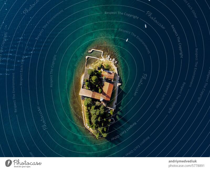 Aerial view of Our Lady of the Rocks or Gospa od Skrpjela and Catholic monastery Saint George in the bay of Kotor, in city of Perast, Adriatic sea, Montenegro. Tourism destination