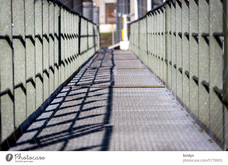 Steel pedestrian bridge with shadows Bridge Corridor Footbridge Metal Sunlight off Traverse Direction Lanes & trails Steel balustrade parapet depth Narrow