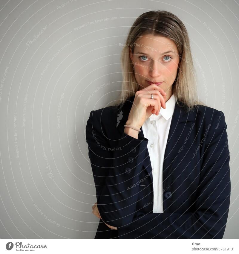 Woman in jacket Blonde portrait Feminine Hand Skeptical Looking Looking into the camera test Long-haired Jacket Businesswomen Jewellery Shirt