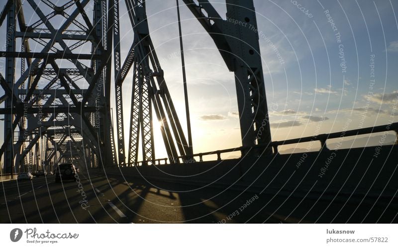 baybridge San Francisco Carrier Steel Half-timbered facade Highway Speed Back-light Physics Sunset Clouds Transport Bridge Street Contrast Warmth Logistics