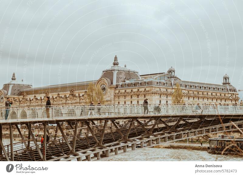 Paris, France during early spring Passerelle Leopold Sedar Senghor bridge paris france street Orsay museum french travel cityscape urban gloomy tourism landmark