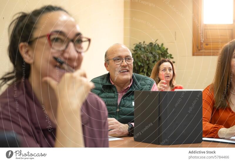 Senior adults engaged in a lively educational class senior learning group diversity participation communal setting focused classroom engagement study workshop