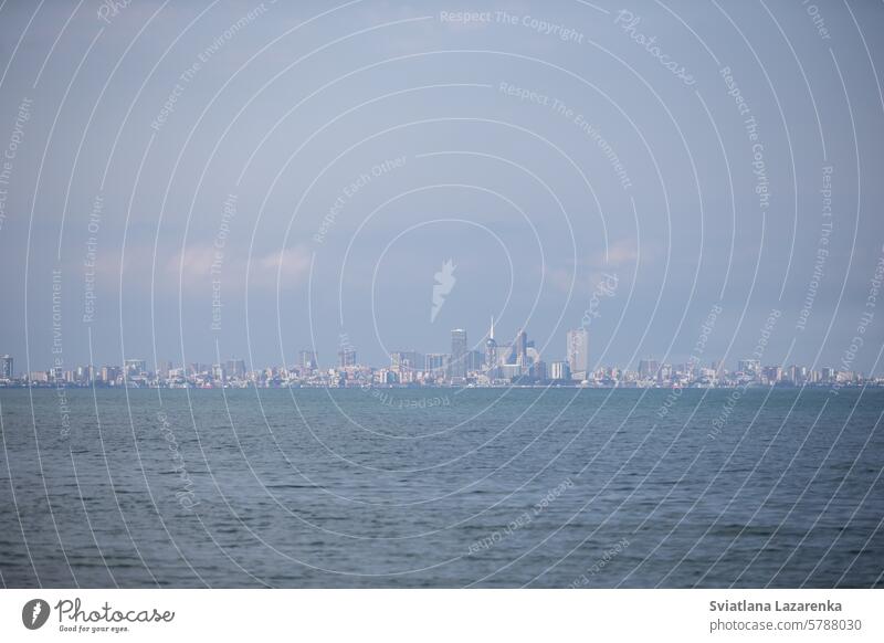 Panorama of the modern city of Batumi from the sea. cityscape skyscraper water urban skyline blue outdoors architecture day nature travel coastline wave