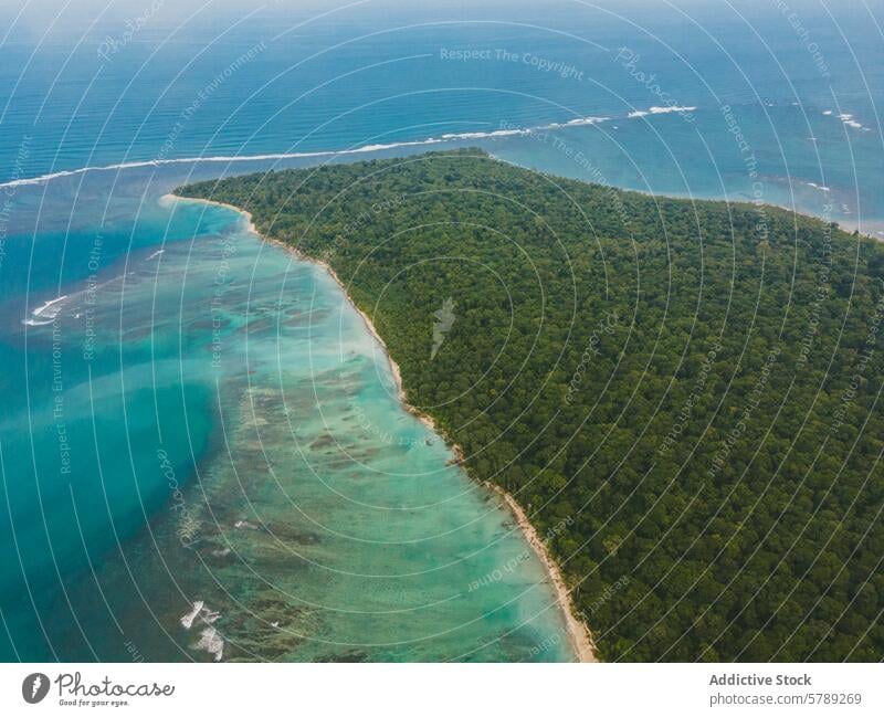 Aerial view of lush coastline in Costa Rica costa rica aerial view turquoise water tropical forest nature beach ocean sea travel paradise tranquil wilderness