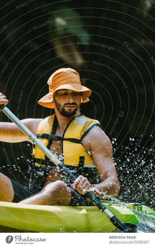 Adventurous Kayaker Navigating Costa Rican Waters kayak man paddle water droplet adventure costa rica outdoor sport river action activity focused travel