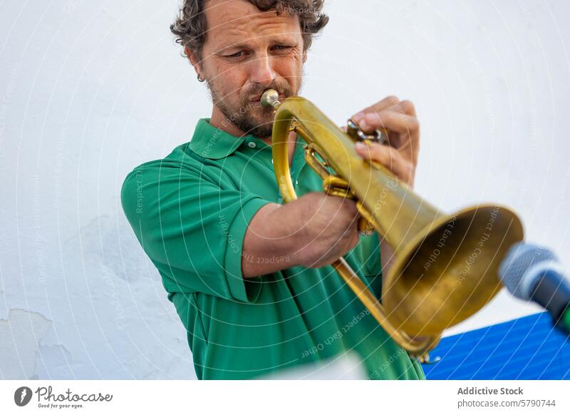 One-armed Trumpeter Performing on the Street one-armed man trumpeter street performance music instrument brass playing musician focus dedication outdoor