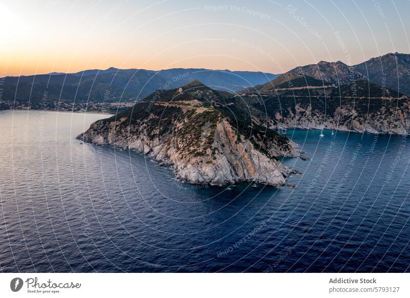 Serene Sunset Over Sardinian Coastline sardinia italy sunset coastline aerial view mediterranean sea blue water cliffs serene landscape travel destination