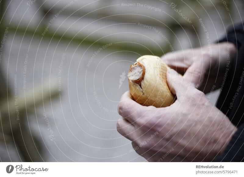 Bratwurst in a roll Eating Snack Fast food Snack bar Appetite Unhealthy Delicious Meal Fat Nutrition To enjoy Food Lunch Sausage Close-up hands sausage