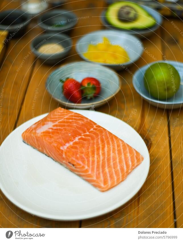 still life of salmon loin with avocado, peach and strawberries agriculture appetizer apple assortment background citrus colorful composition concept creative