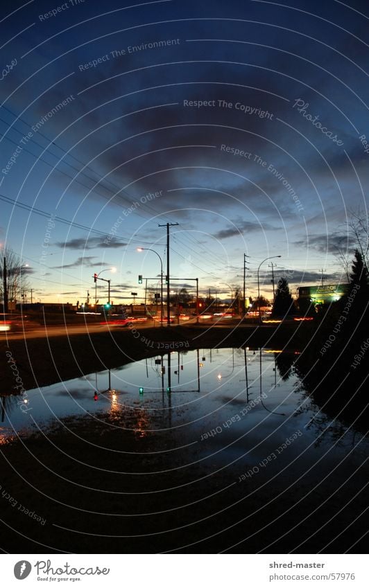 Traffic in NorthVan Transport Reflection Puddle Sunset