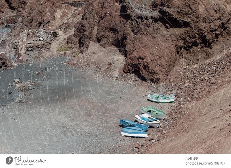 View into a waterless bay with several boats on dry land Bay Boats on the beach aridity Climate change coast heat - temperature Drought Hot Dry Environment