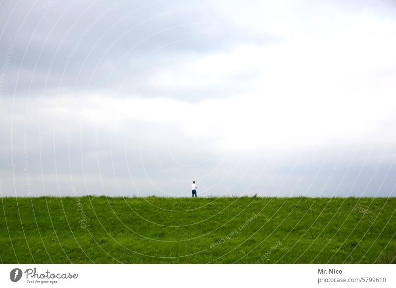 loner stroll To go for a walk Dike Grass Dam Promenade Loneliness Sky Nature Landscape Environment Lanes & trails Hill by oneself Lonely