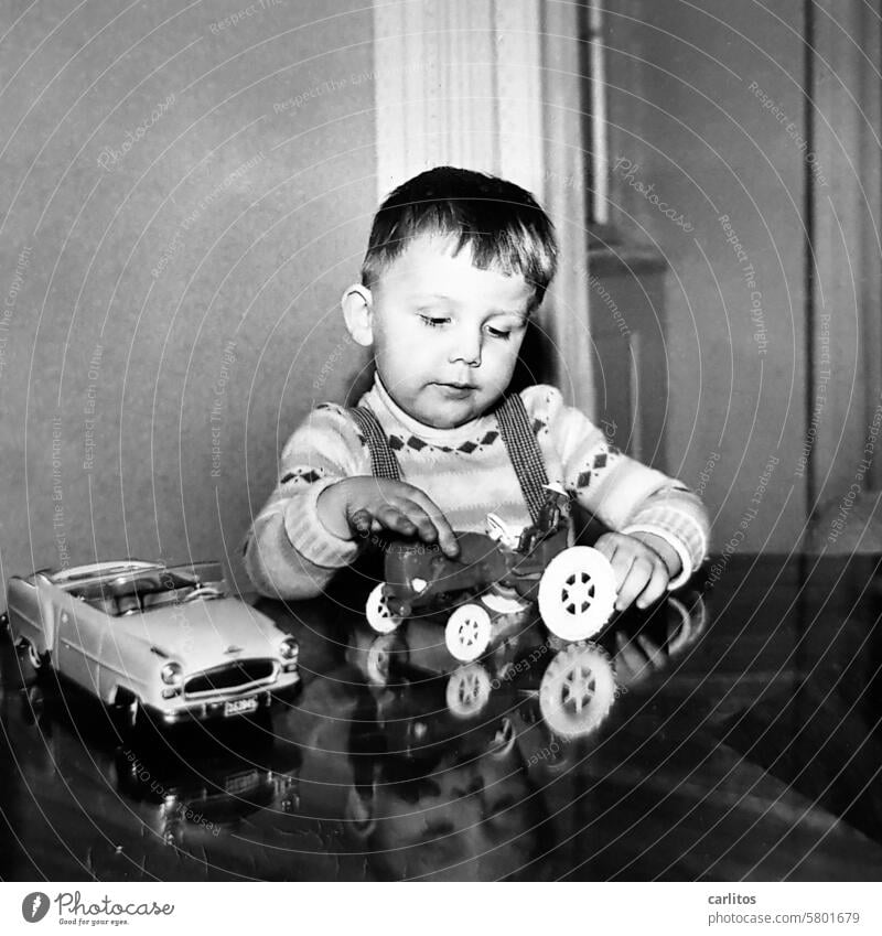 Little carl and his favorite toy Boy (child) fifties 1960s Toys Tractor fortunate Playing Black & white photo reflection 50s '60s Retro Style Convertible