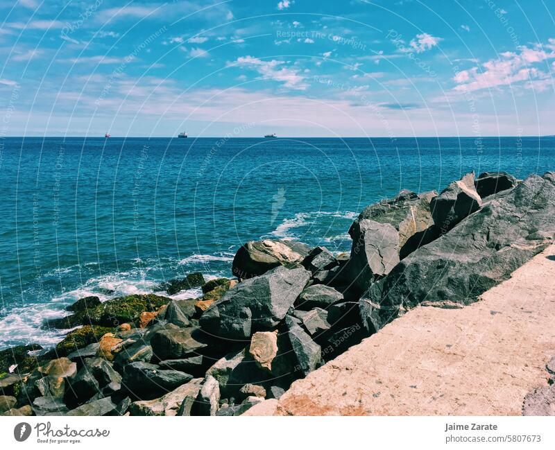 View facing the sea where the horizon is lost sky clouds stones rock land viña del mar chile tourism travel journey beach