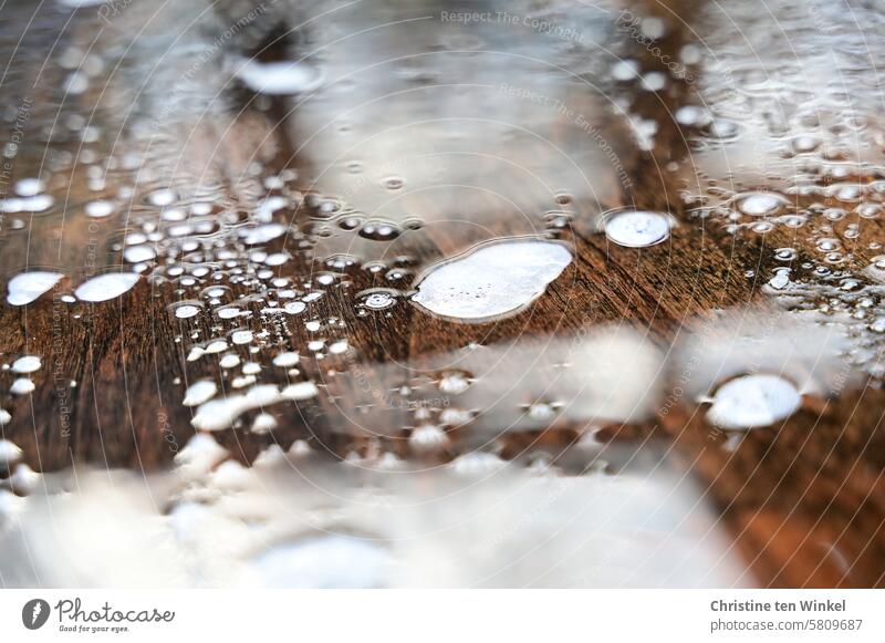 a wet wooden table with soap lather Wooden table Soap suds Wet Spring cleaning purge soapy water Clean Cleaning Dirty Living or residing housework frowzy