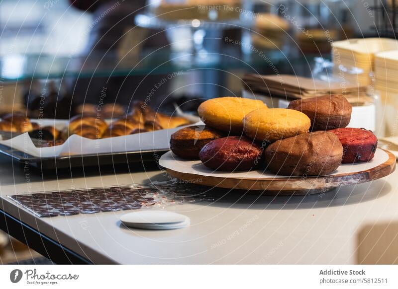 Appetizing sponge cakes in tray in bakehouse bakery counter dessert vegan assorted stall pastry treat sweet food tasty appetizing sugar recipe product various