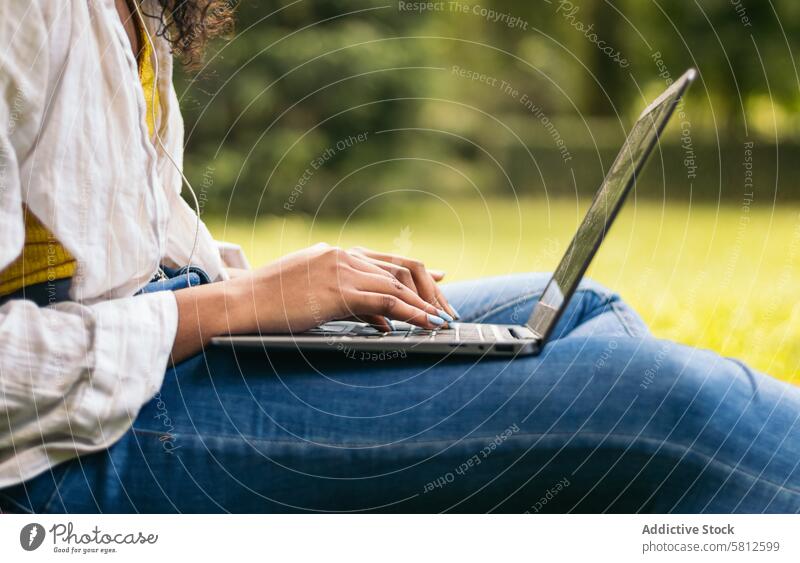 College student working with laptop on campus education college university learning school computer female sitting technology young happy study people studying