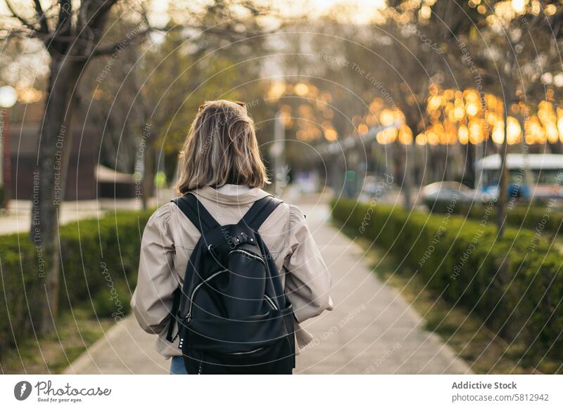 Back view portrait of a blonde student girl female young person caucasian back background isolated beautiful people white standing woman hair behind