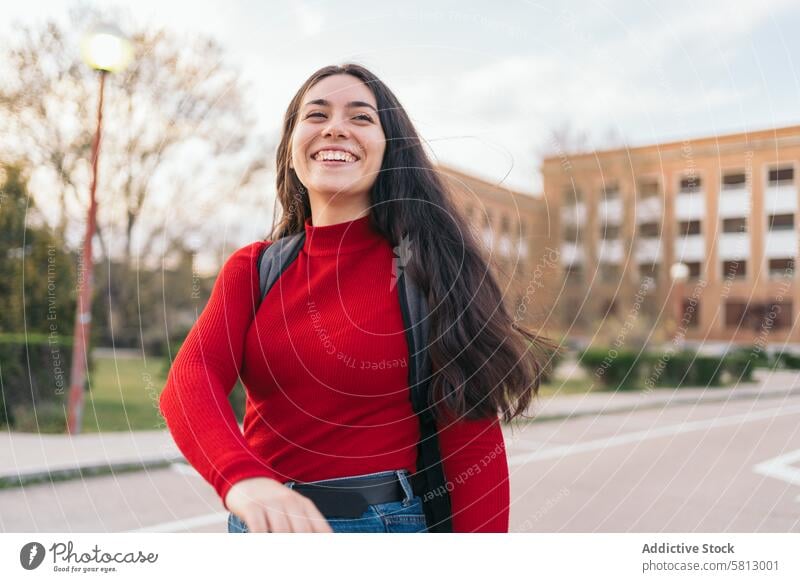 beautiful Student girl portrait leaving class and smiling happy education young student school cute female backpack smile teenager person building bag youth