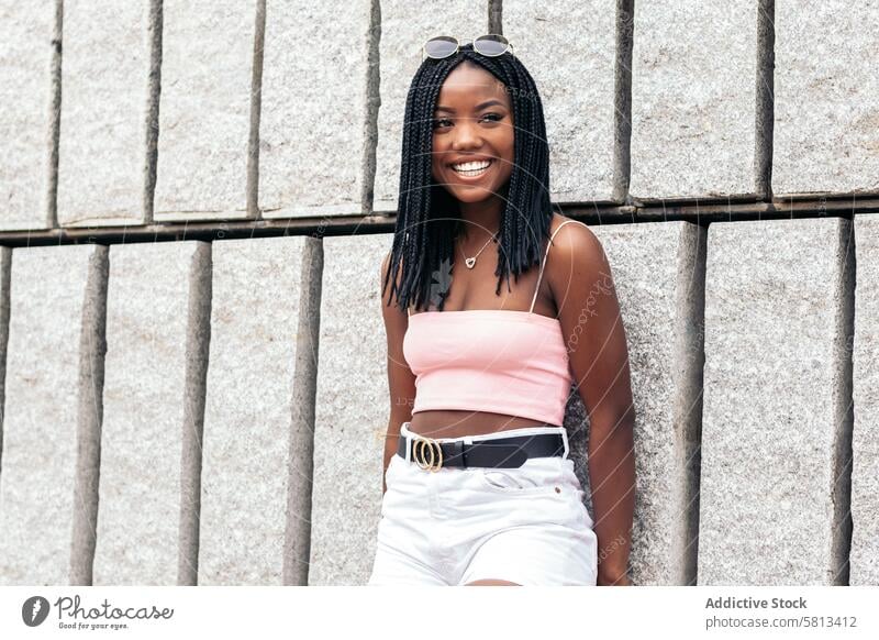 Portrait of a black young woman enjoying in the city African American Summer Youth Communication Joy Laughter Happiness Leisure Relaxation Outdoors Fun