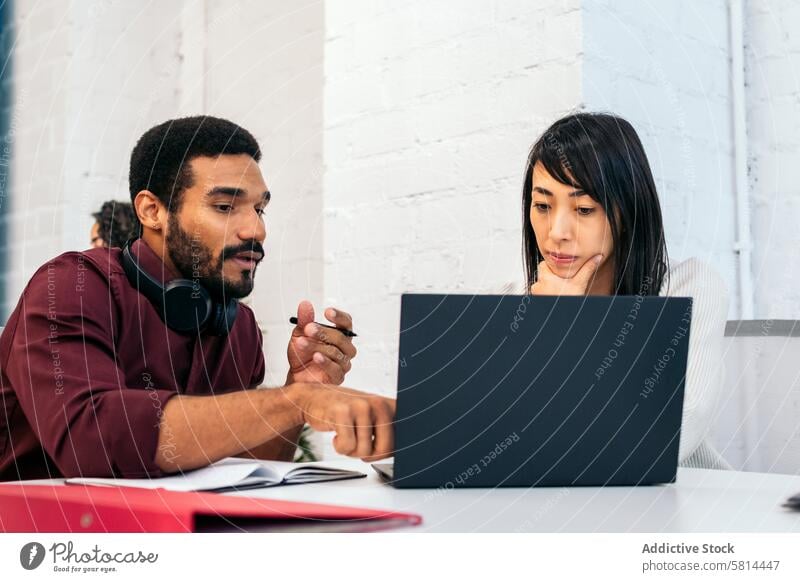 Working in Community: A Day in the Coworking Space ethnicity diversity office business company meeting productivity brainstorming coworking professional laptop