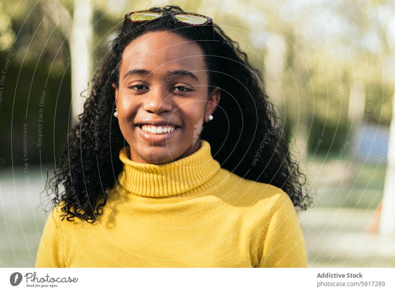 young african american girl portrait smiling woman beautiful female black happy person beauty people background happiness face afro attractive adult smile