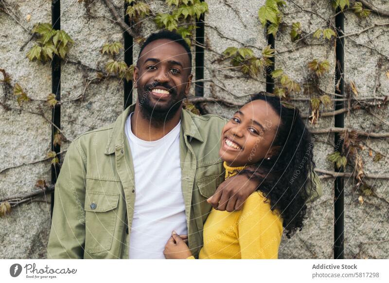 afro american couple portrait smiling and holding each other man black woman love happy female together people young background relationship person romantic