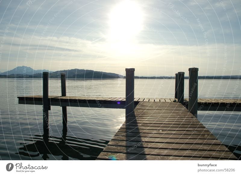 the silence at the lake Lake Zugersee Lake Vantage point Calm To enjoy Footbridge Romance Dream Hope Desire Loneliness Break Sunset Dusk Water Blue Looking Wait