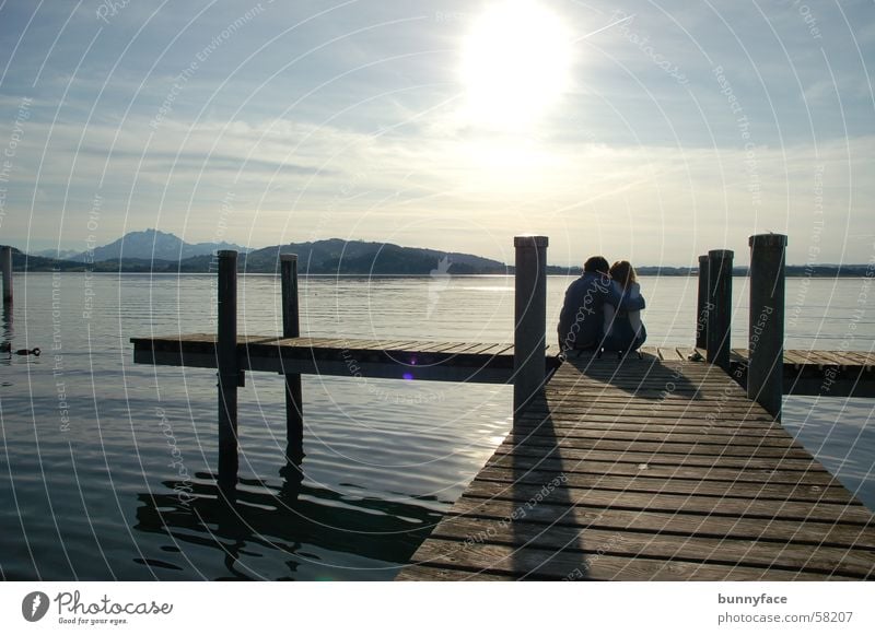 together alone Friendship Relationship Lake Sunset Together Calm To enjoy Footbridge Love Emotions Blue Water Coast Evening Far-off places Deep Loneliness