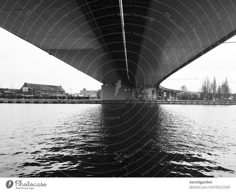 Where there is shadow, there is also light. Bridge Black & white photo River Traverse Town urban Architecture Exterior shot Water Sky River bank Deserted off