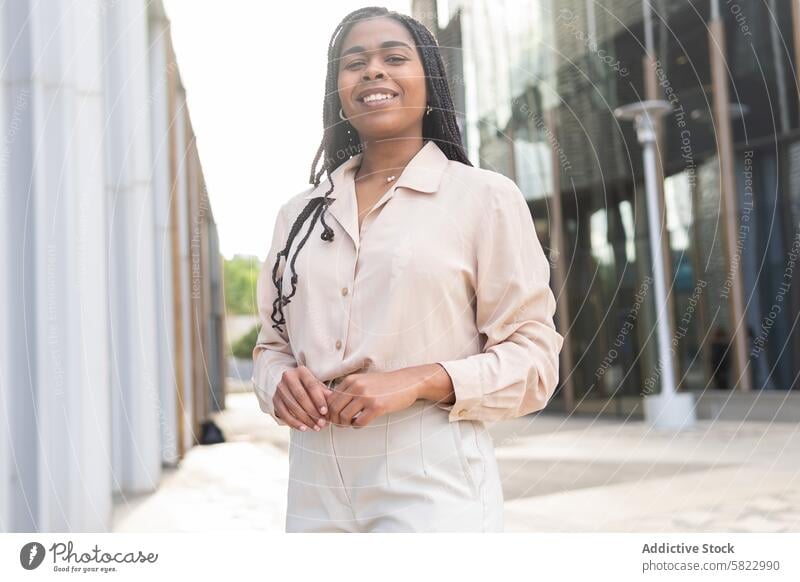 Cheerful woman enjoying summer in Barcelona smile sunny barcelona street cheerful young lifestyle happy bright city african american urban outdoor friend