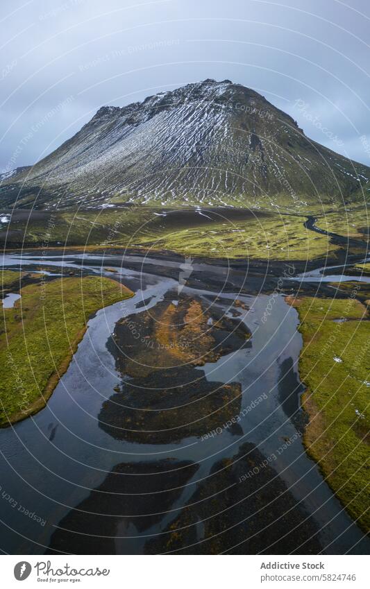 Majestic mountain peak with river in highlands aerial view nature landscape majestic natural outdoor snow-capped verdant grandeur terrain scenic beauty