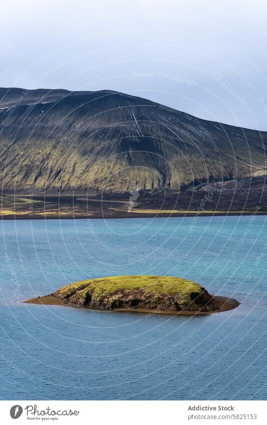 Icelandic highlands with serene volcanic landscape iceland volcano mountain lake islet tranquil blue green lush natural scenic beauty outdoors travel calm water