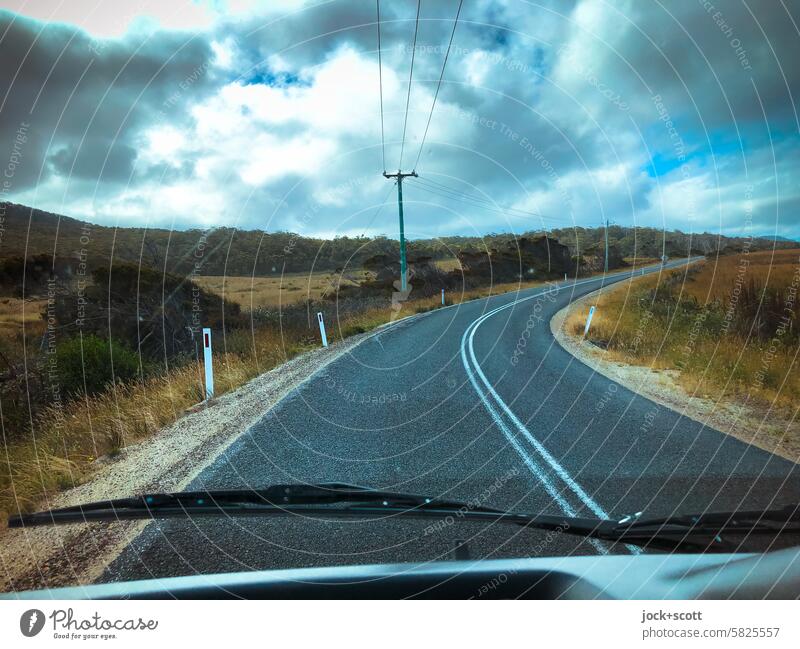 Road trip, always along the road Traffic infrastructure Nature dashboard FRontwheel Sky Clouds Landscape Windscreen wiper Tasmania Australia Motoring Driving