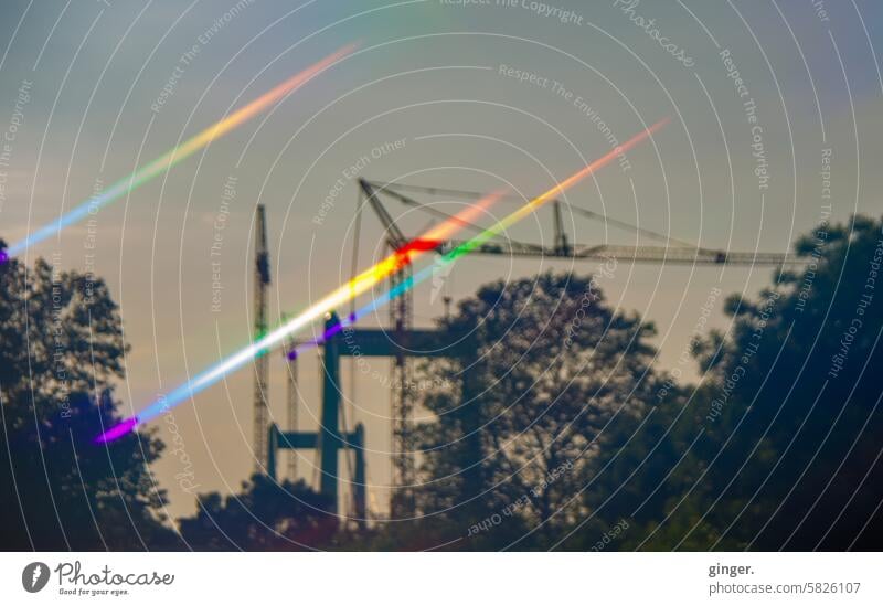 Closed Mülheim Bridge with construction cranes and spectral flashes - photography with prisms and filters Construction cranes Cologne blurriness Architecture