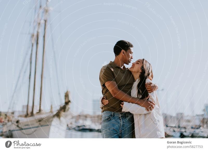 Serene stroll along Barcelona marina at with vintage sailing vessel Spain couple walk boats moored peaceful morning serene harbour dock wooden ship cityscape